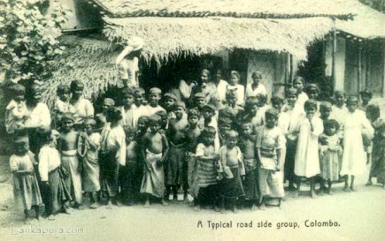 A Typical road side group of natives, Ceylon