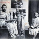 Buddhist Priest & Young Pupils